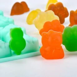 Silicone Candy Molds Gummy Molds - Chocolate Molds Mini Dinosaur Mold, Cat Claw Mold, Ring Mold BPA Free Nonstick Set Of 4 -Wilton Shop 41R43YyNhpL