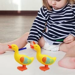 Winding Clockwork Toy Jumping Yellow Duck Simulation Animal Infant Enlightenment Boys And Girls Learn To Climb 1 To 8 Years Old Toy Classroom Exchange Valentines Day Cards -Wilton Shop 5155vOpl9uL