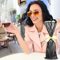 Etallic Mylar Wine Black Gift Bags For Bottles Sparkle Look- Great For A Wine Pull - (25 Pieces) -Wilton Shop 51DWHfDtTuL