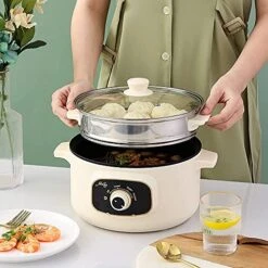 110V Electric Skillet, Multi-Functional Rice Cooker Food Steamer Nonstick Personal Hot Pot With Lid For Home Student Dormitory Cook Steam Simmer Stir Fry Griddle (2.2L, With Steamer) -Wilton Shop 51a3Ppy5zfL